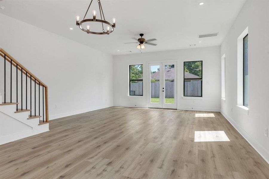 Living area. Open concept. Natural lighting for those weekend morning delights.