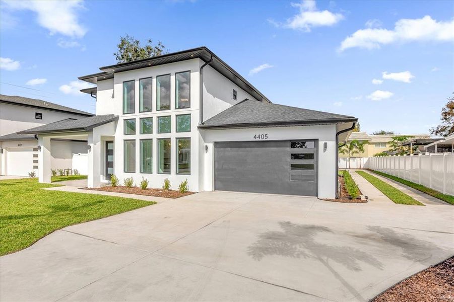 Plenty of parking space in garage and driveway