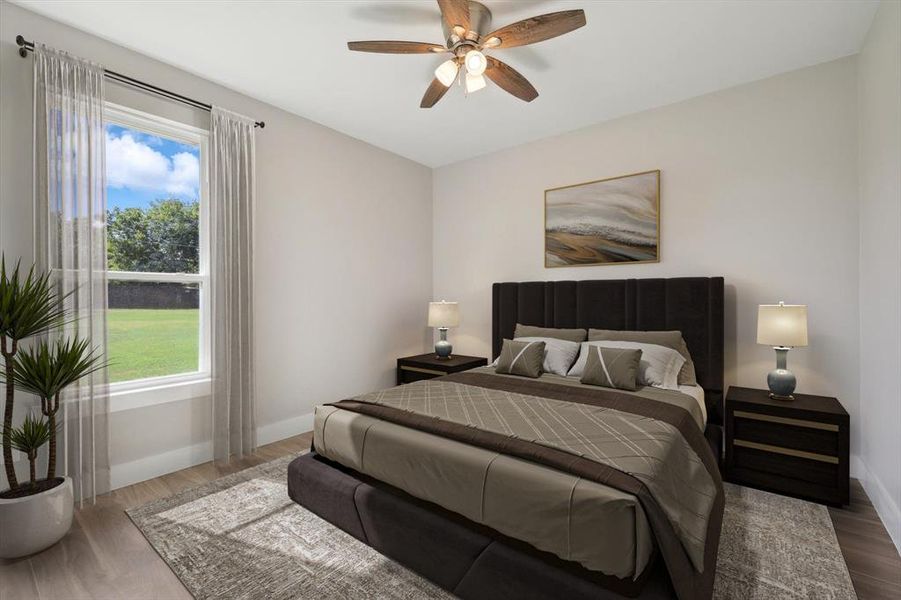 This is the smallest of the bedrooms and is located right next to the master and laundry room [photo is virtually staged]