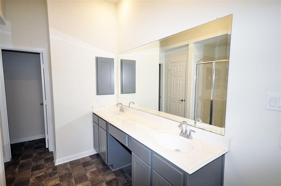 Dual vanities in the master Bath.