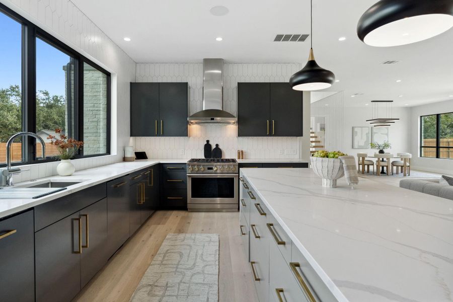 Abundant storage throughout this spacious, oversized kitchen.