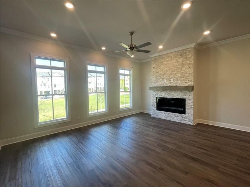 Look at this enormous space in the family room. Your sectional will fit perfectly here!