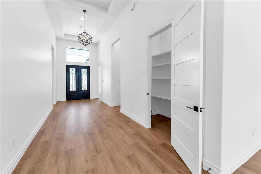 Coat closet off foyer