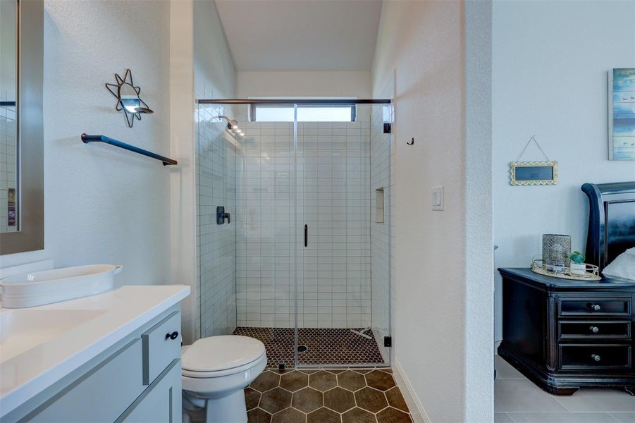 View Suite with Tiled Walk in Shower and floating Vanity