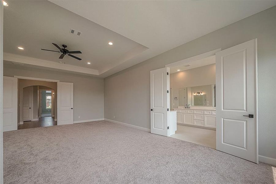 Primary Bedroom with Double Doors to Primary Bath