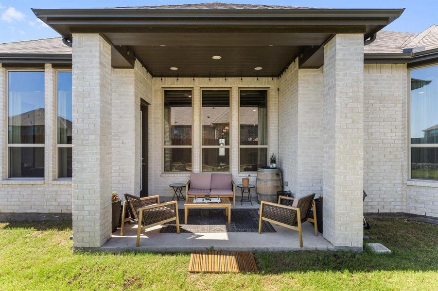 View of patio with an outdoor living space