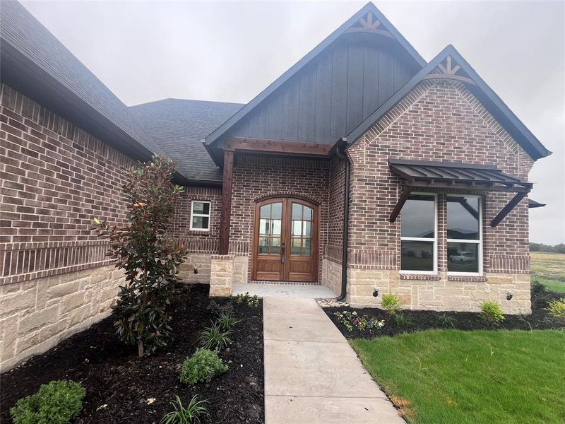 View of exterior entry with french doors