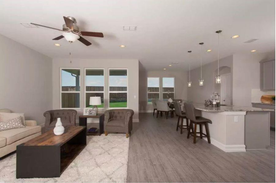 Photo of Pulte model home with same floor plan, not of actual home listed.