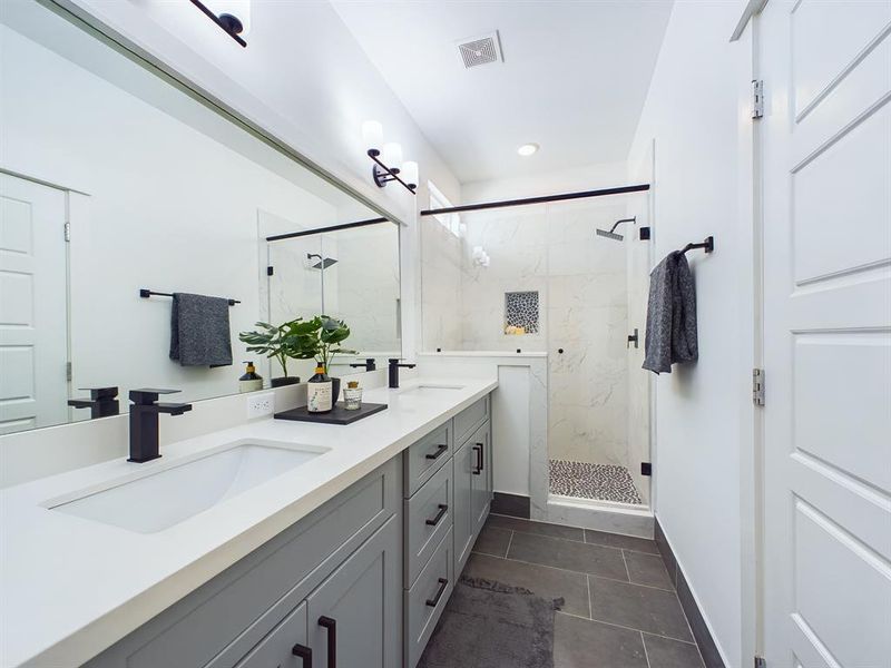 Beautiful Primary Bath with Quartz double sink vanity top and soft close drawers and doors.