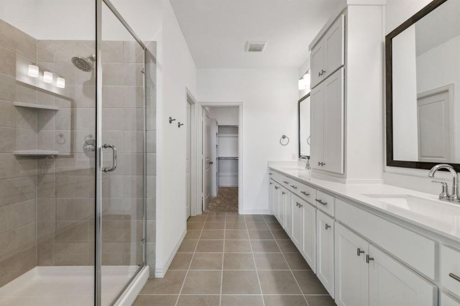 This oversized walk in shower is the perfect place to start or end your day.