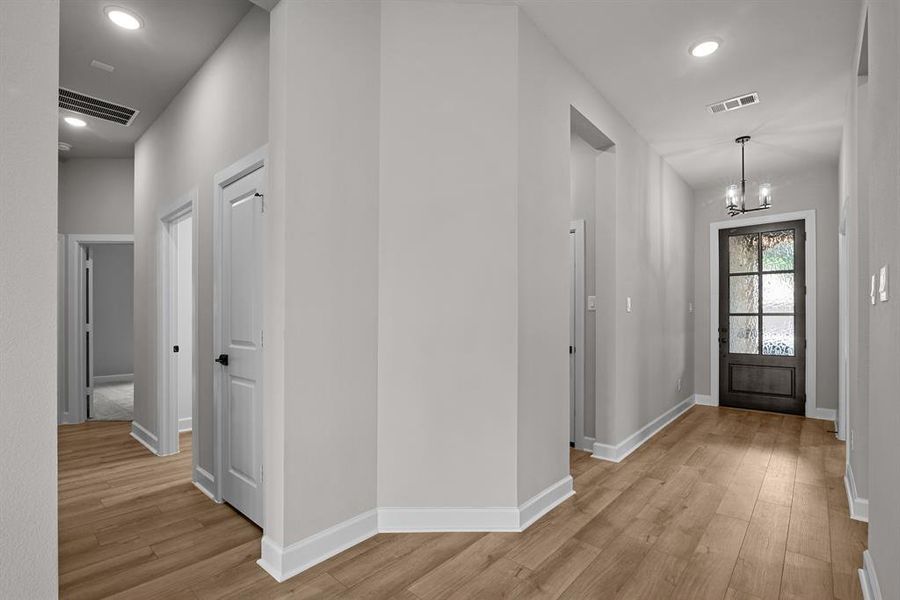 EXAMPLE PHOTO: 8 ft front door, high ceilings!