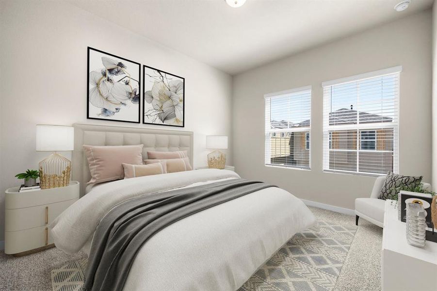 Secondary bedroom features plush carpet, neutral paint, large window and ample closet space.