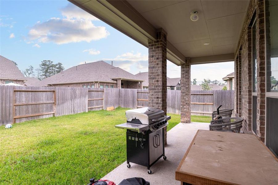 Sunning outdoor patio, perfect for entertainment and relaxation.