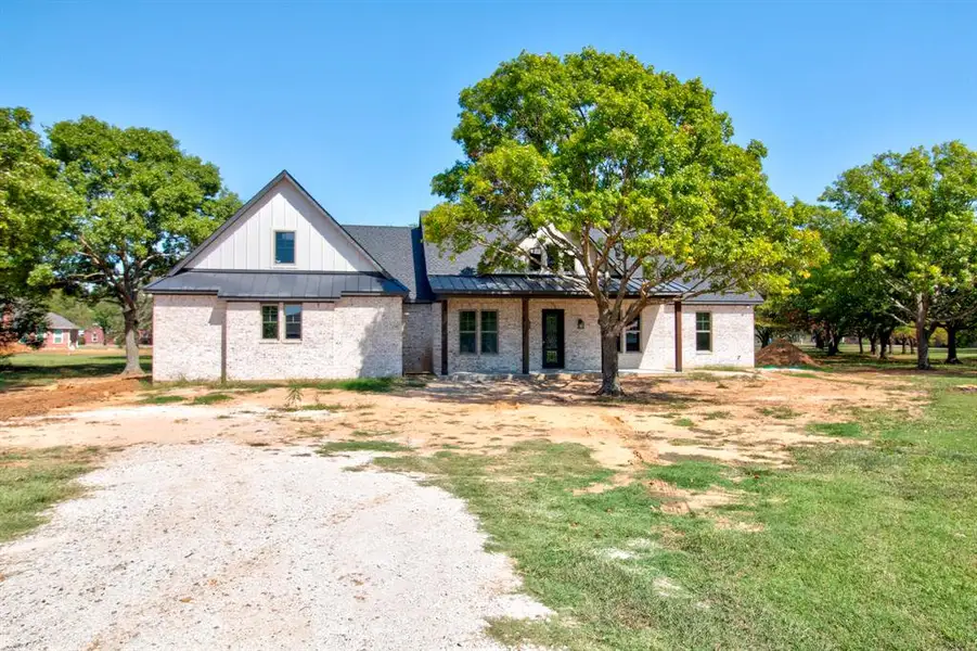 View of front of home with a front yard