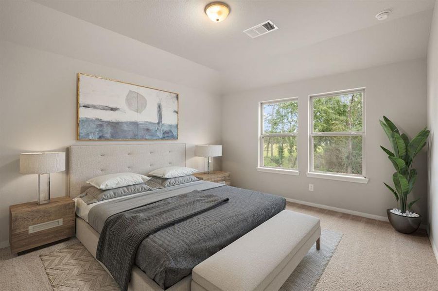 The primary bedroom is generously sized, creating a tranquil and spacious retreat that offers ample room for relaxation. Featuring plush carpet, high ceilings, fresh paint, and large windows that lets in natural lighting throughout the day.