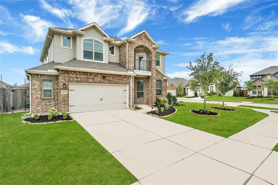 Welcome to your new two story five-bedroom gorgeous home located on an over-sized corner lot!