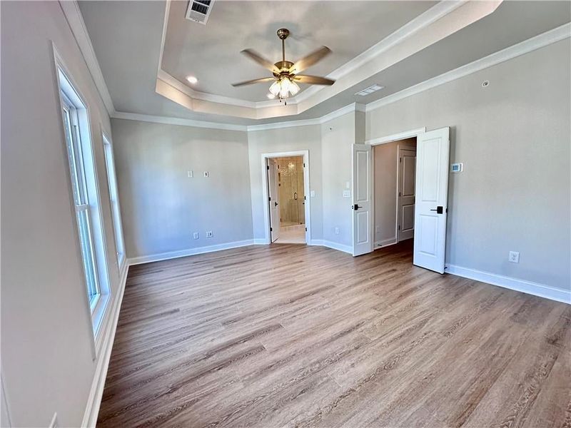 Two sets of French doors lead into the owner suite as well as the owner suite bathroom