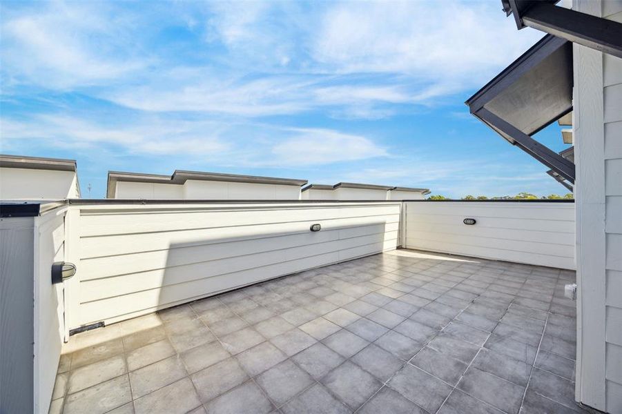 Open air outdoor space on the roof deck would be a perfect place to stargaze or have friends over for a BBQ cookout.