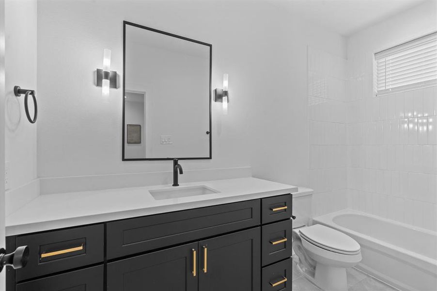 Full bathroom- Third floor Photos are of another home by the same builder)