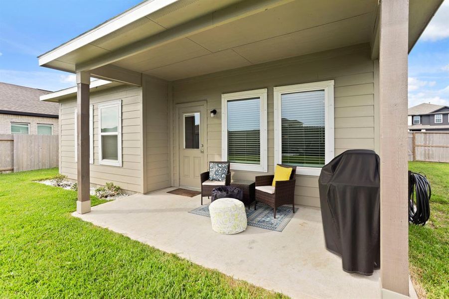 Experience the charm of this cozy back patio, perfect for relaxation and outdoor enjoyment.