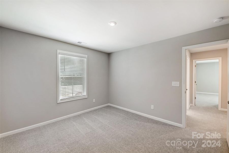 Bedroom Three with Walk-In Closet