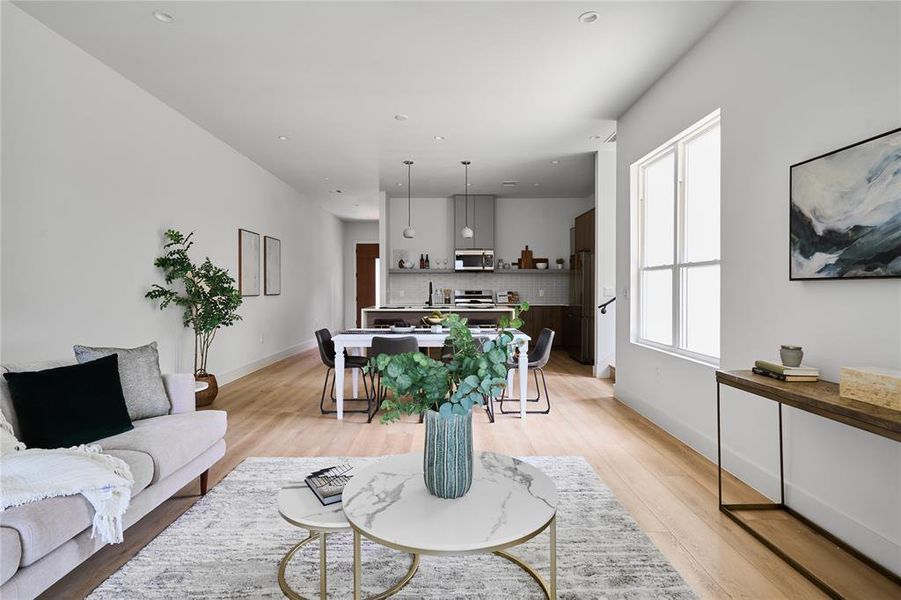 Huge living room with a ton of natural light and windows