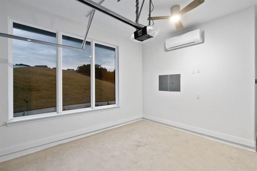 This is the 4th garage that is attached to the house and has HVAC making it the ideal workout room