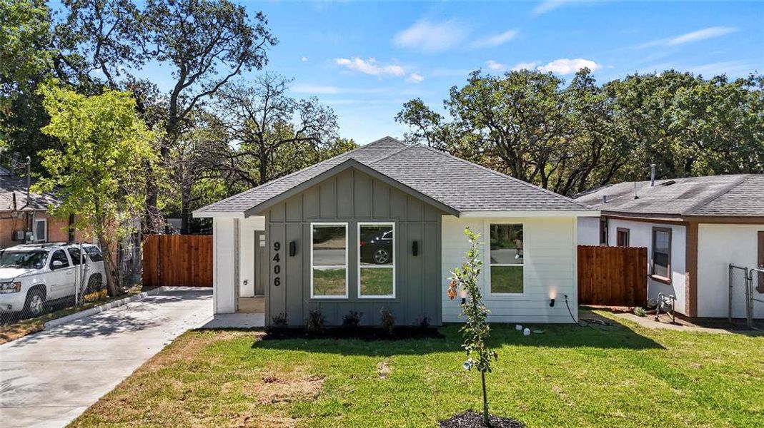 View of front of home with a front lawn