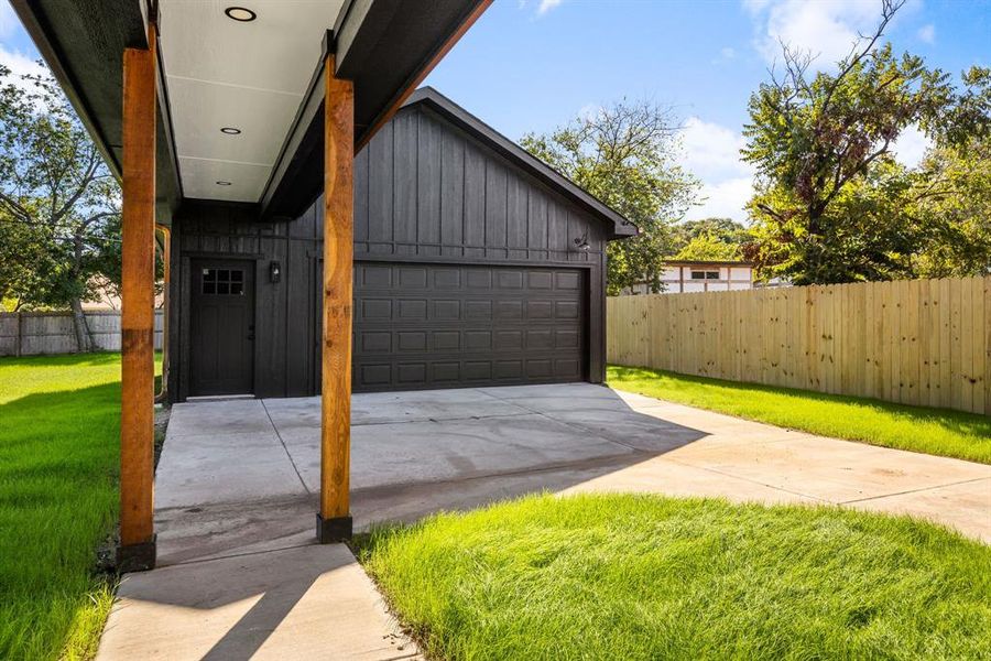 Garage with a lawn