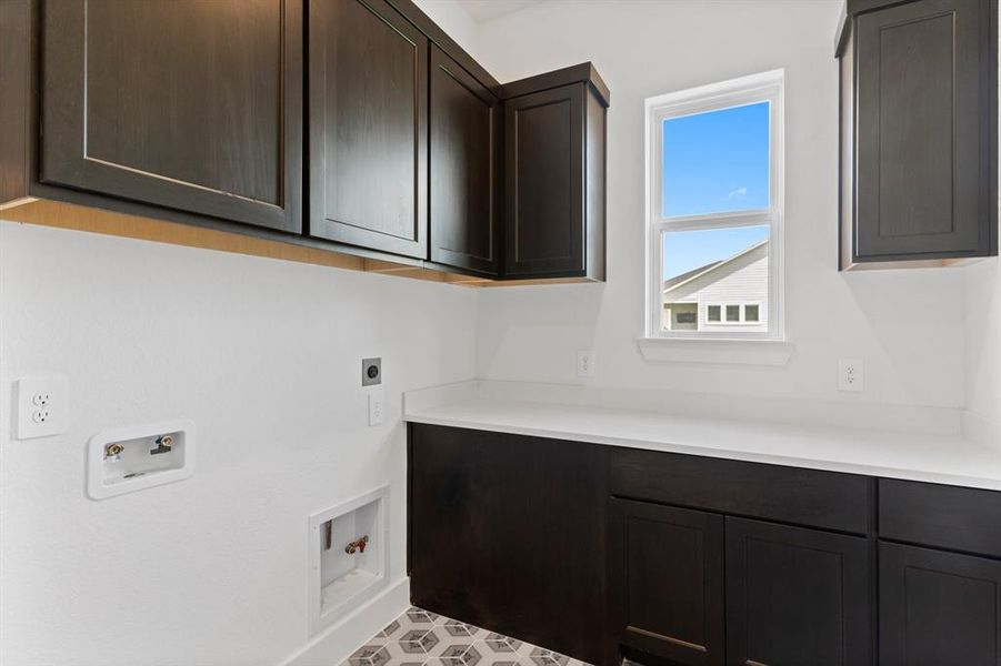 Utility Room with Storage Cabinets and Counterspace