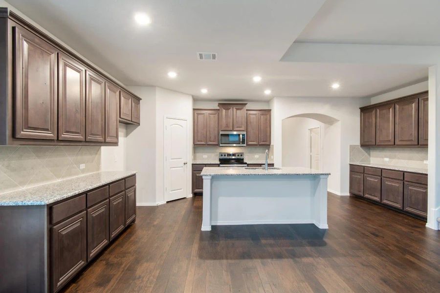 Kitchen | Concept 2844 at Hunters Ridge in Crowley, TX by Landsea Homes