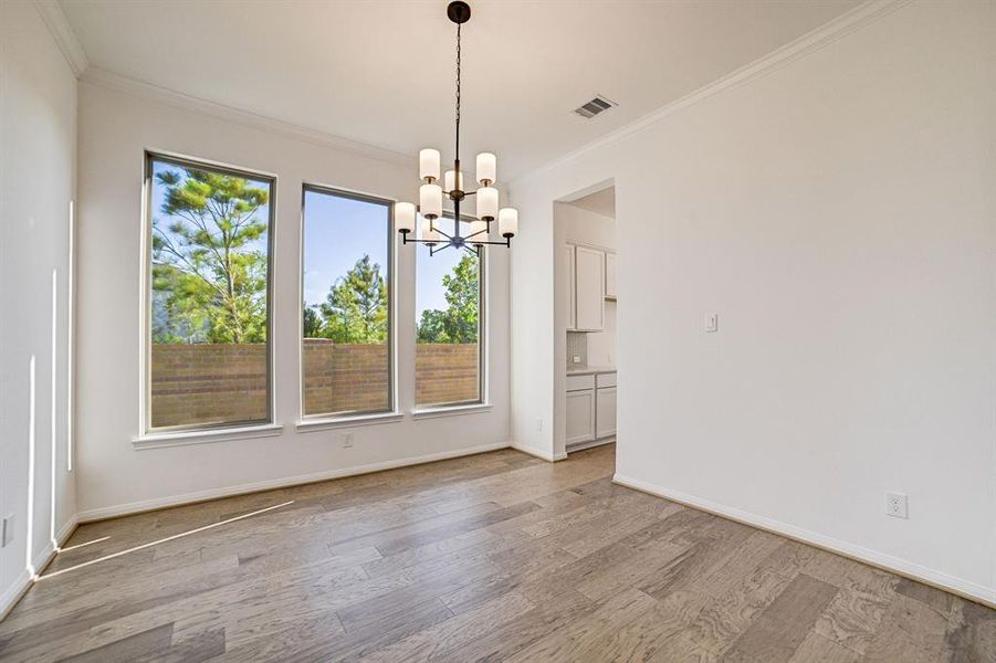 Stunning dining room, with large windows and access to kitchen via butler's pantry.