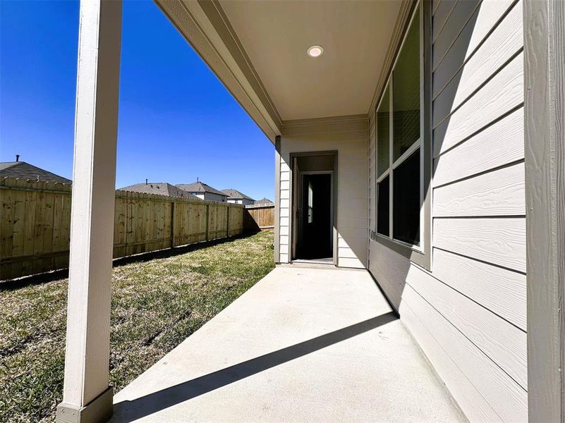 Rear covered patio for your gatherings & relaxing evenings