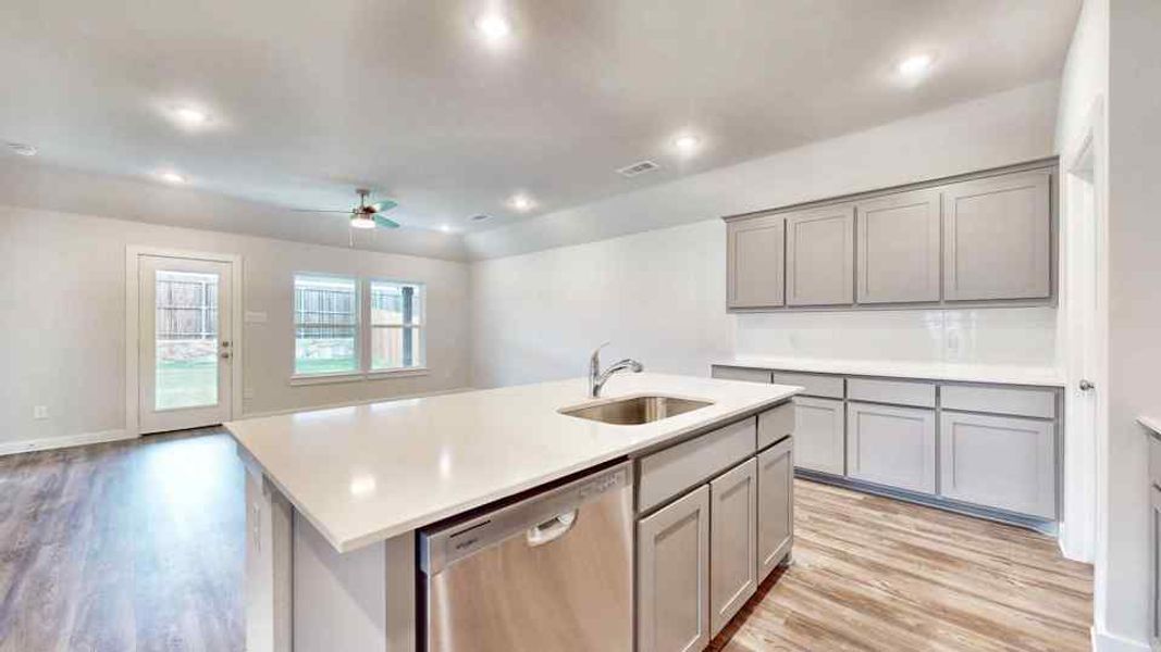 quartz counters with cool cabinets