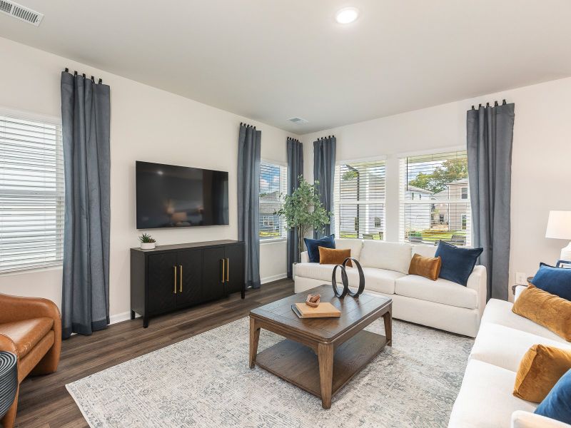 Living area in the Chandler floorplan at a Meritage Homes community in Angier, NC.