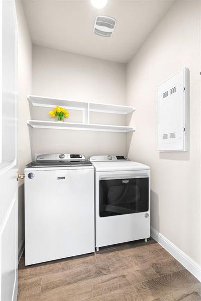 Functional laundry room with built-in shelving!