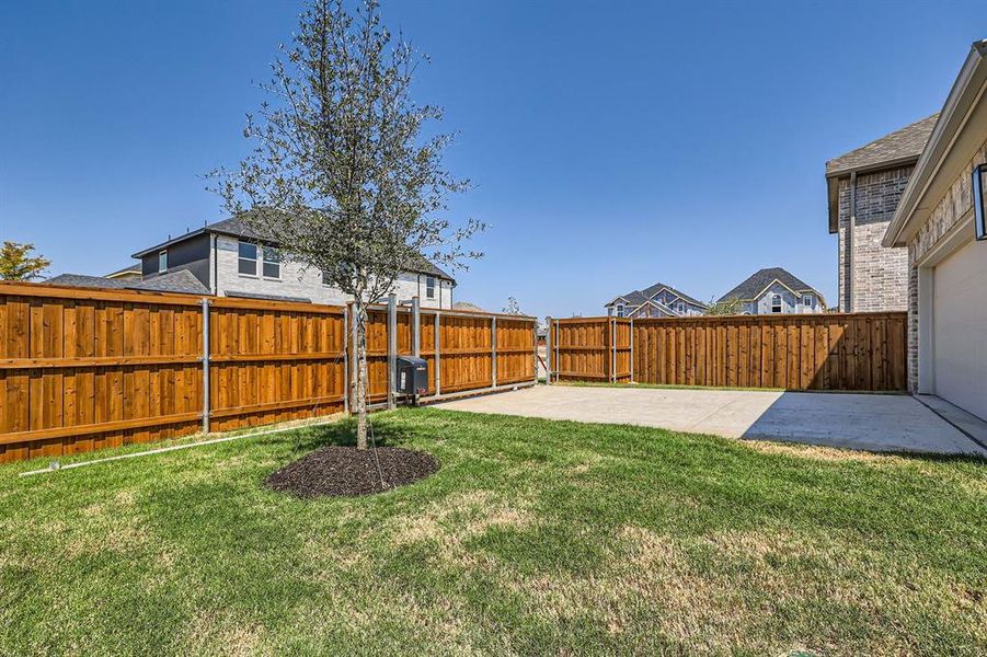 View of yard with a patio