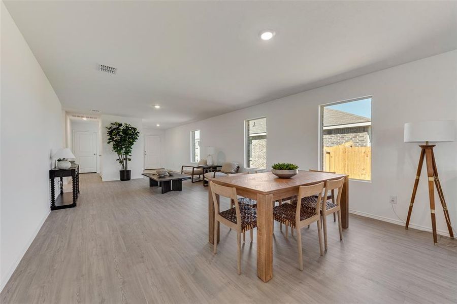 Dining space featuring light wood-type flooring