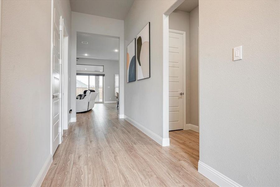 Hall featuring light hardwood / wood-style floors