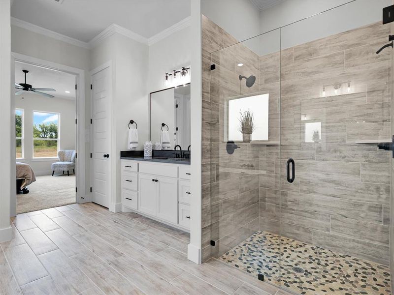 Bathroom featuring a large walk in shower.