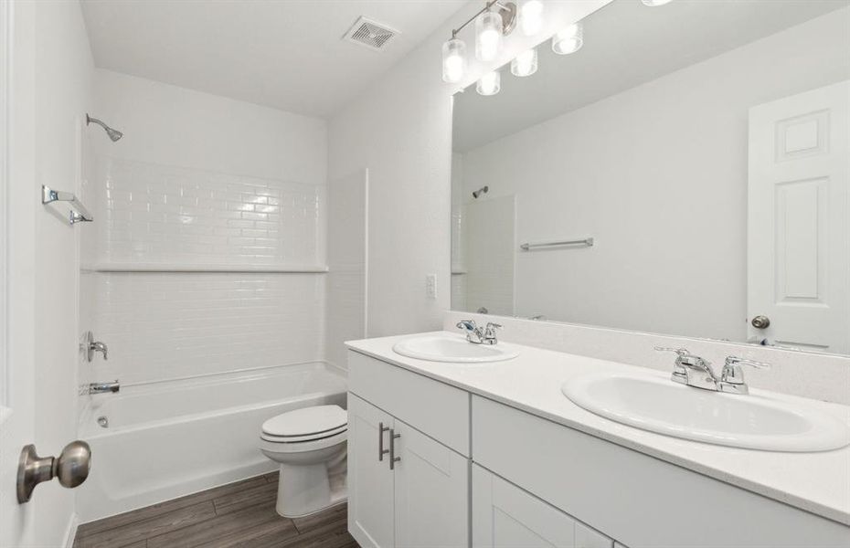 Spacious secondary bathroom*real home pictured