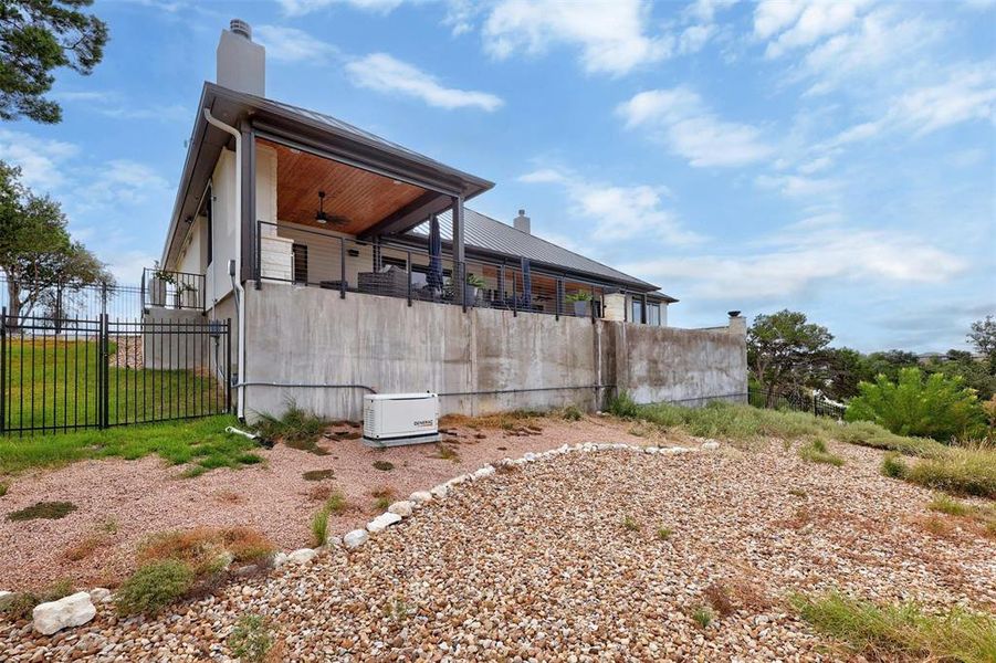 Generac whole house 26KW generator installed 2024 and more backyard space below the huge outdoor patio/pool area.