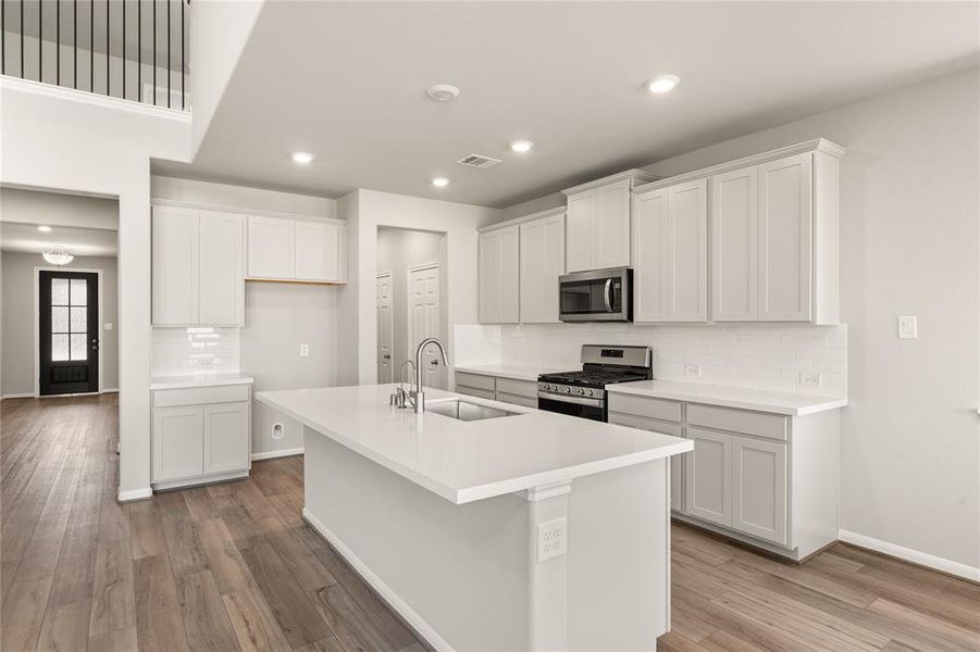 This kitchen is not only a functional space but also has ample storage. Whether you're a seasoned chef or just love to gather and enjoy good food, this kitchen is a dream come true.