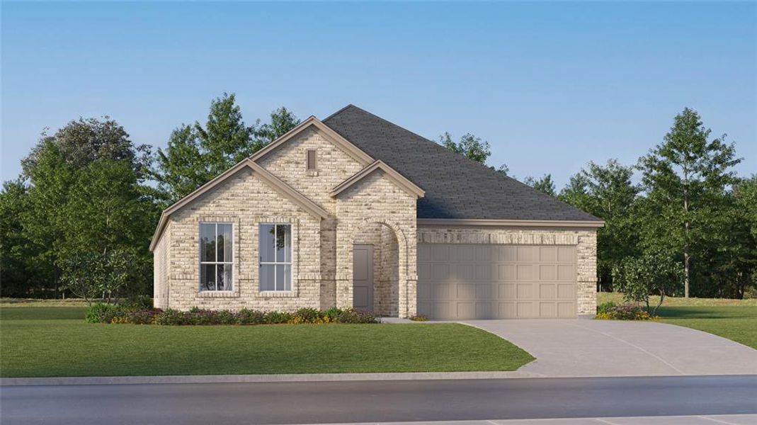 View of front of home featuring a garage and a front yard