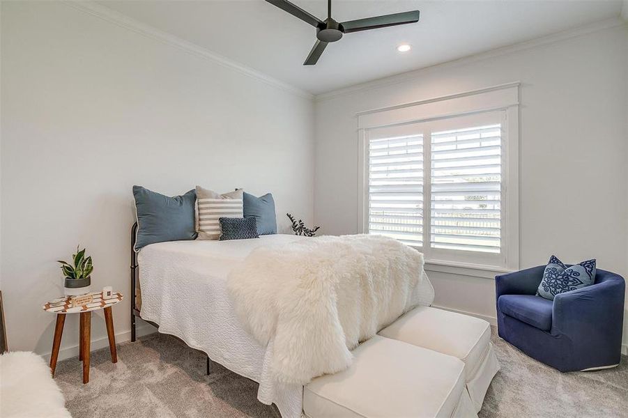 Charming third bedroom with natural light and neutral tones, perfect for guests or family members.