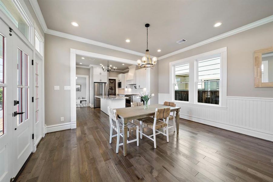 Note the connection between Dining area and Kitchen! SOLID HICKORY floors continue!