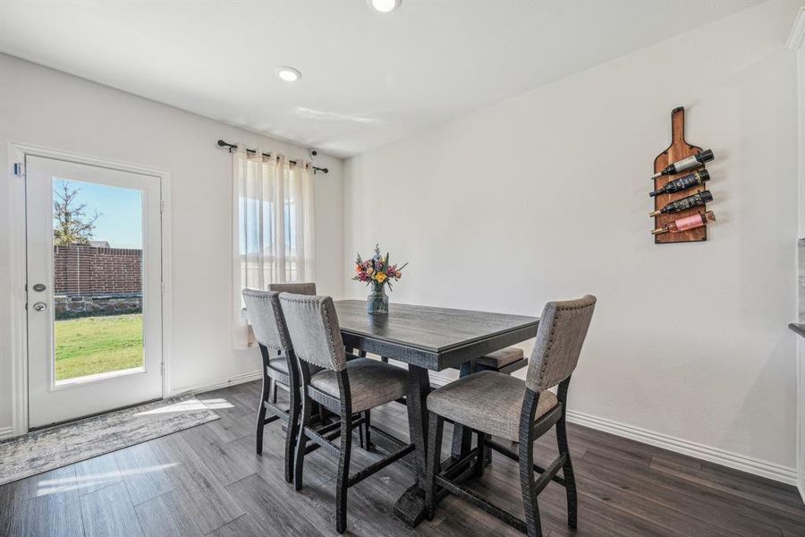 Dining area featuring dark hardwood / wood-style floors