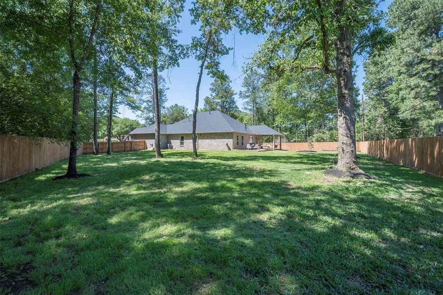 The Cedar fence is a year old and has been completely stained with a water sealer to extend its life! Both sides of the property have gates for easy access to the backyard. Let your imagination run wild with all of the space! Easily fit a 30x30 out building and a pool!