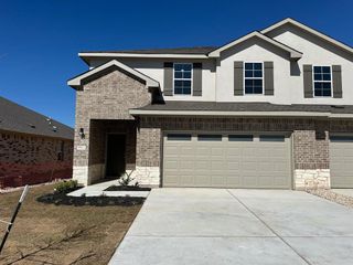 New construction Townhouse house 18524 Cremello Dr, Unit A, Manor, TX 78653 The Pecan- photo 1