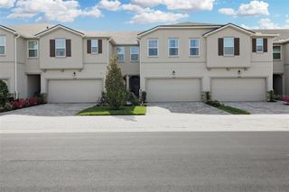 New construction Townhouse house 19392 Great Intention Way, Lutz, FL 33558 - photo 1